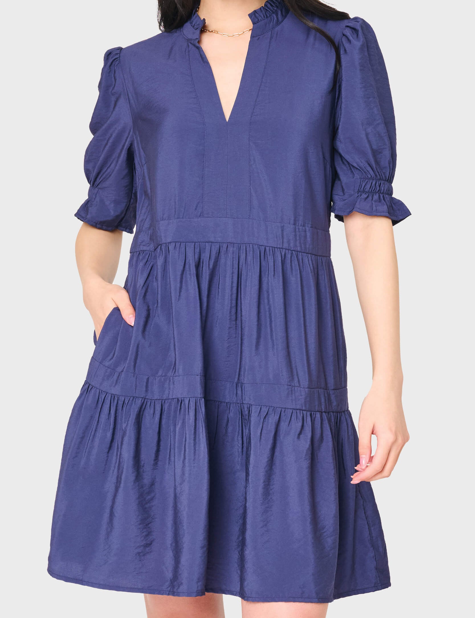 Navy puff sleeve tiered day dress with ruffle neckline and side pockets | JSQ Mercantile – a women’s boutique and gift shop in La Grange, IL.