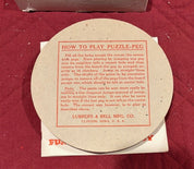 1929 Puzzle-Peg Board Game by Lubbers & Bell Mfg. Complete with instructions.