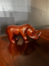 hand carved wooden rhinocerous figurine