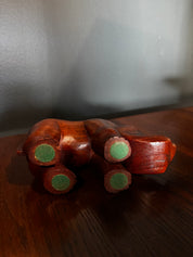 hand carved wooden rhinocerous figurine