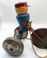 1920's Gong Boy on Tricycle